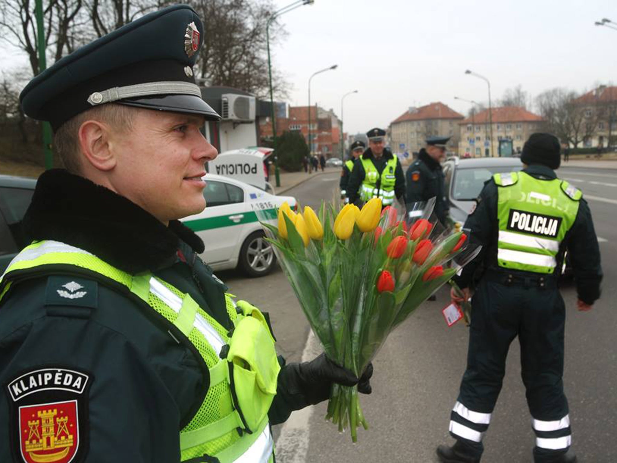 International Womens Day Lithuanian Police Surprise Female Drivers With Flowers To Celebrate